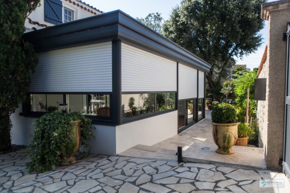 Véranda volet roulant