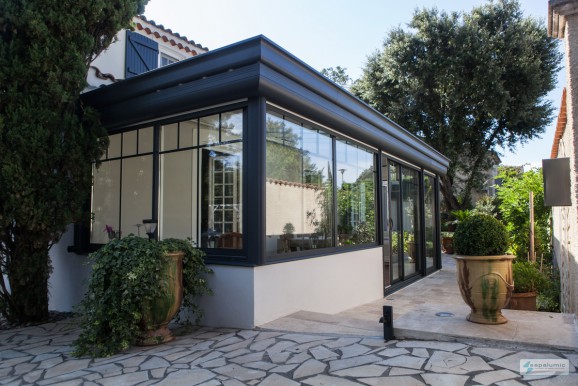 Véranda volet roulant